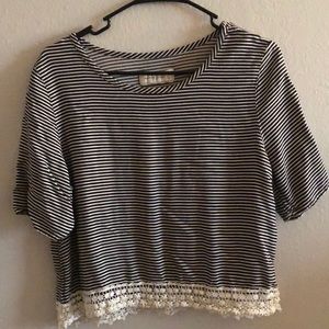 Striped shirt with floral trim